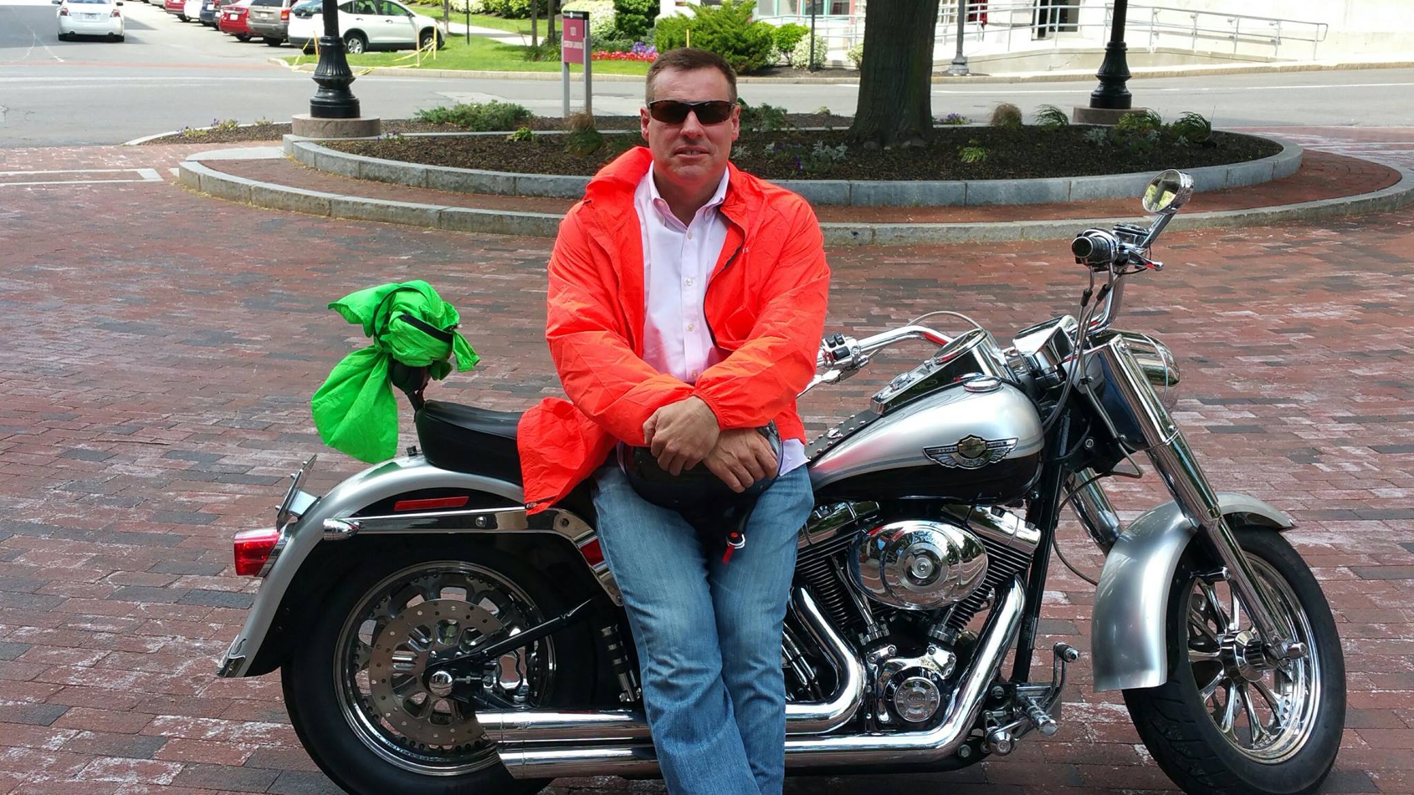 Ken Mann is pictured sitting on his motorcycle